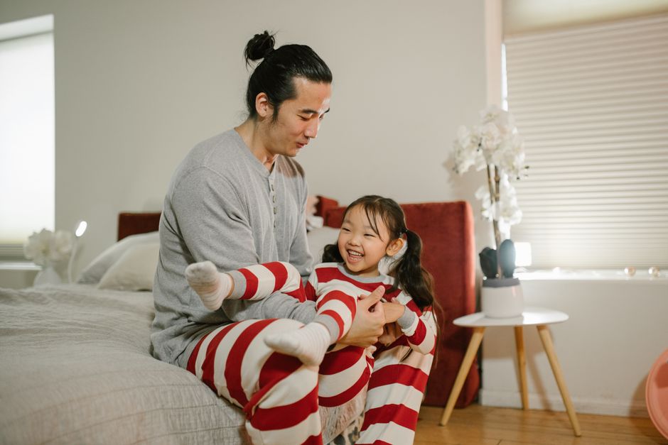 A therapist gently following a child's lead during play at home