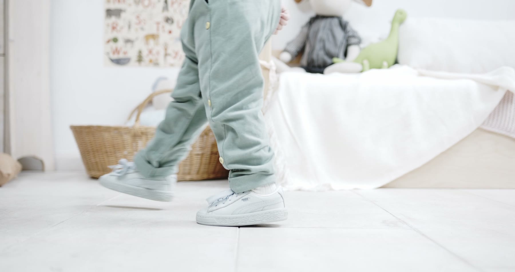 Child playing in a softly colored room