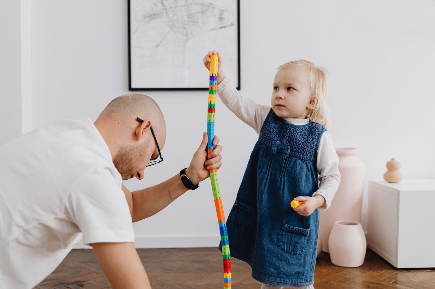 Father and daughter bonding through playtime activities