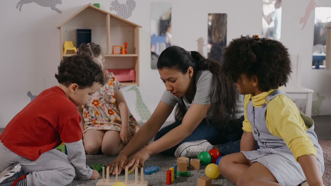 Therapist teaching children during an activity
