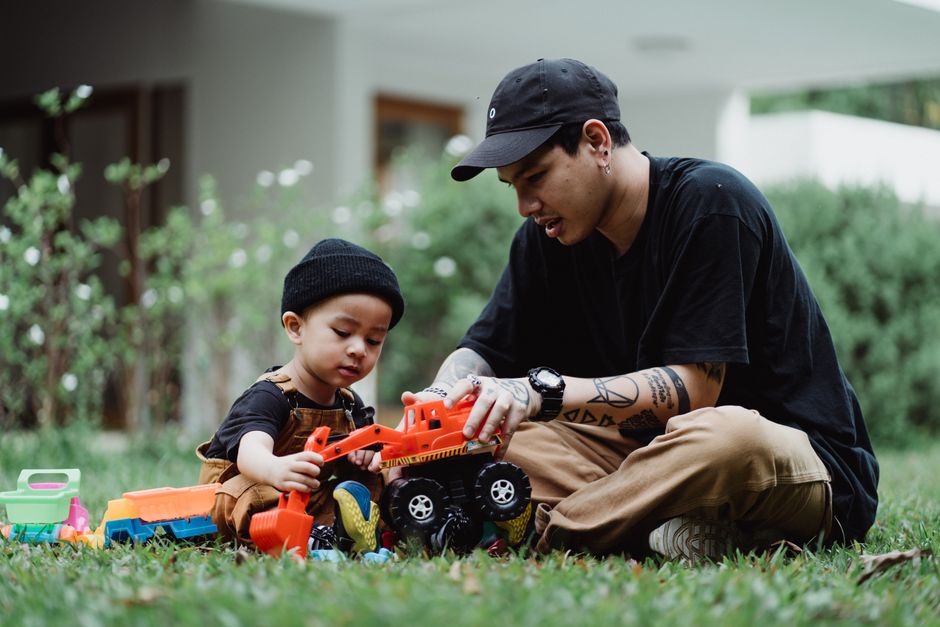 A child practicing a new skill at home with a parent