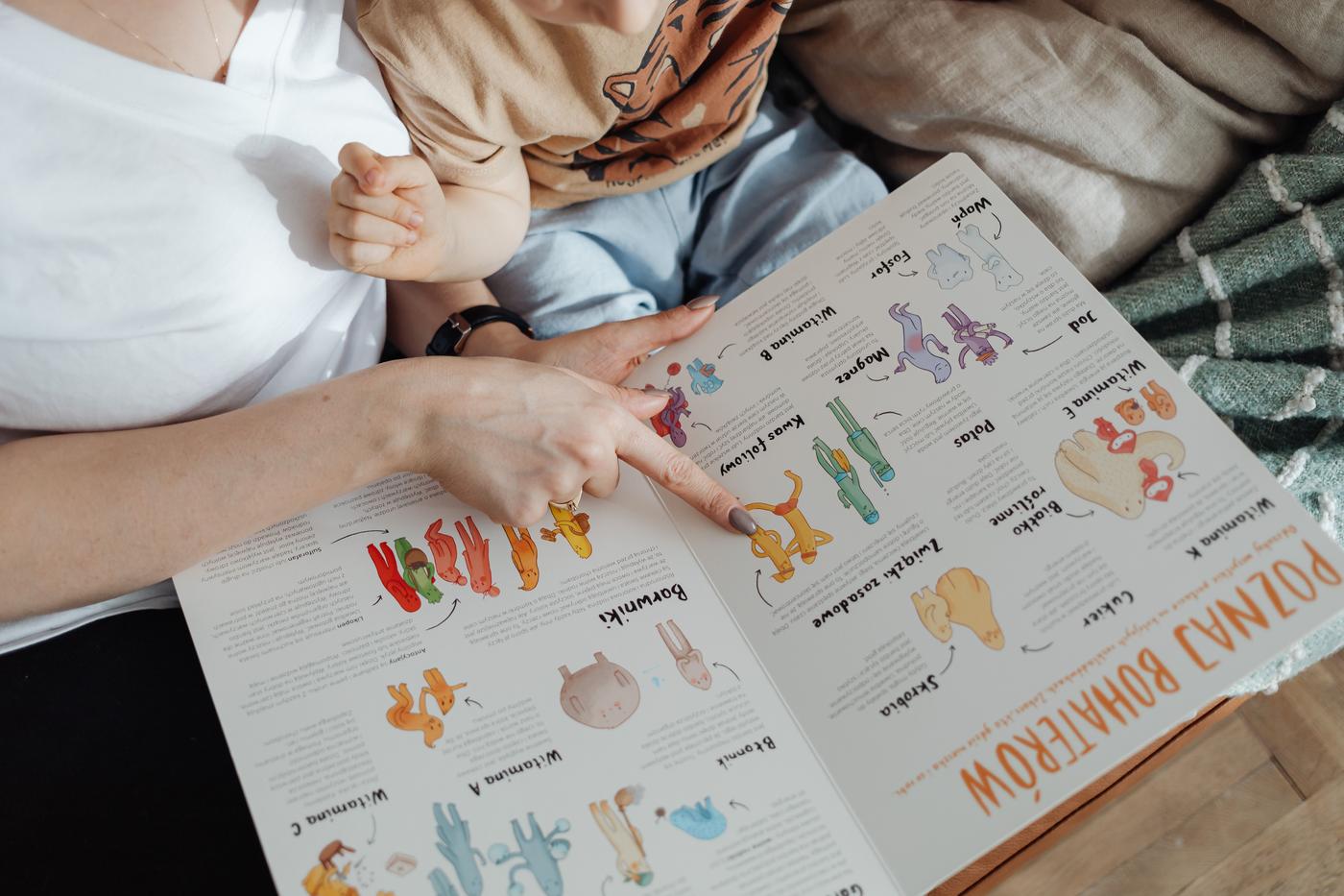 A comforting moment of a mother reading a colorful picture book with her child